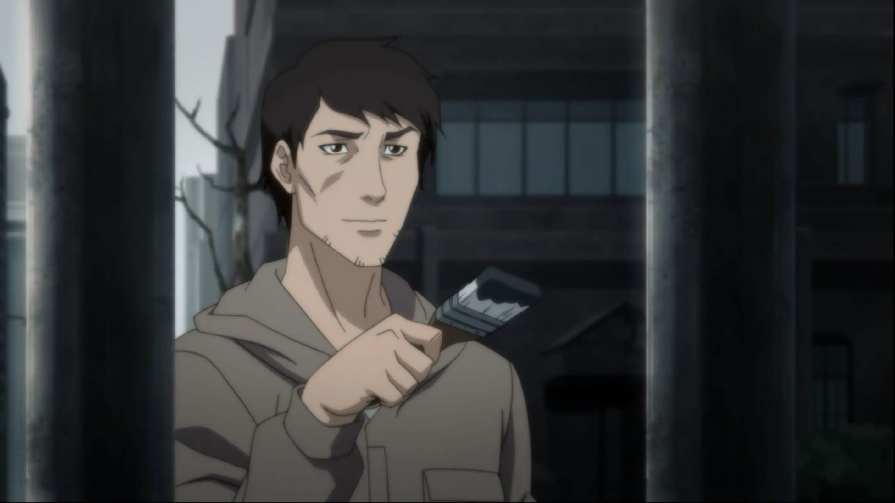 protagonista pintando una verja